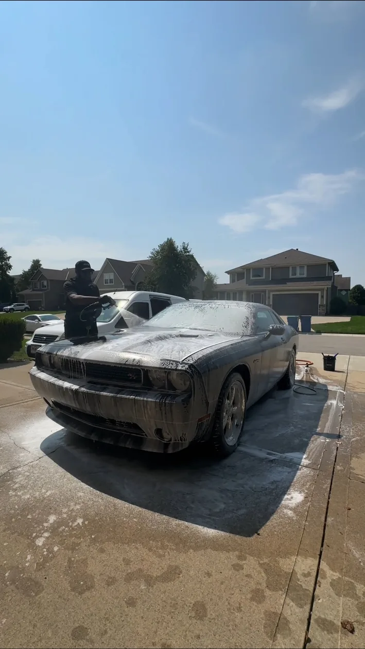 DJ's Pro Detailing washing a Challenger